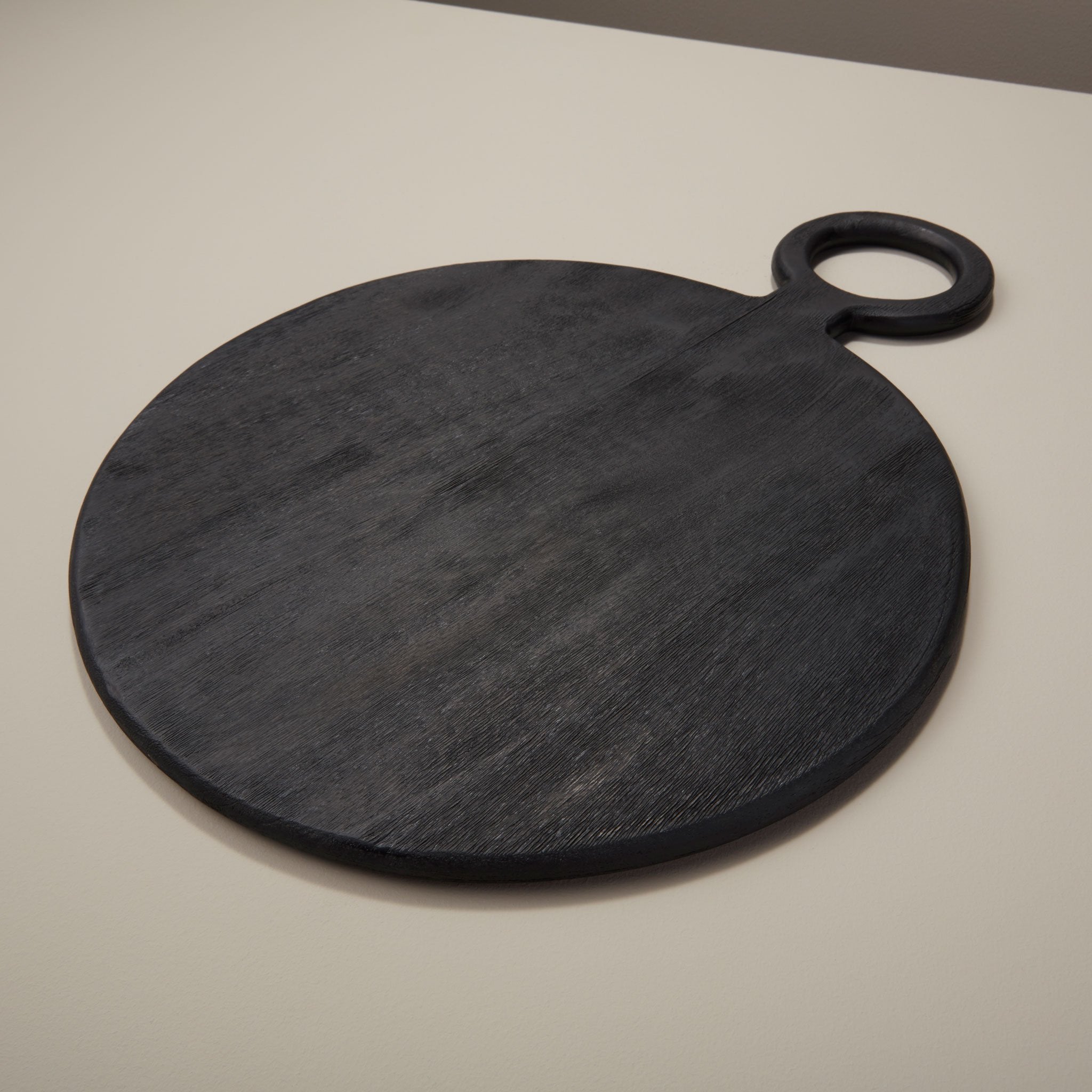 Medium Black Mango Wood Round Board